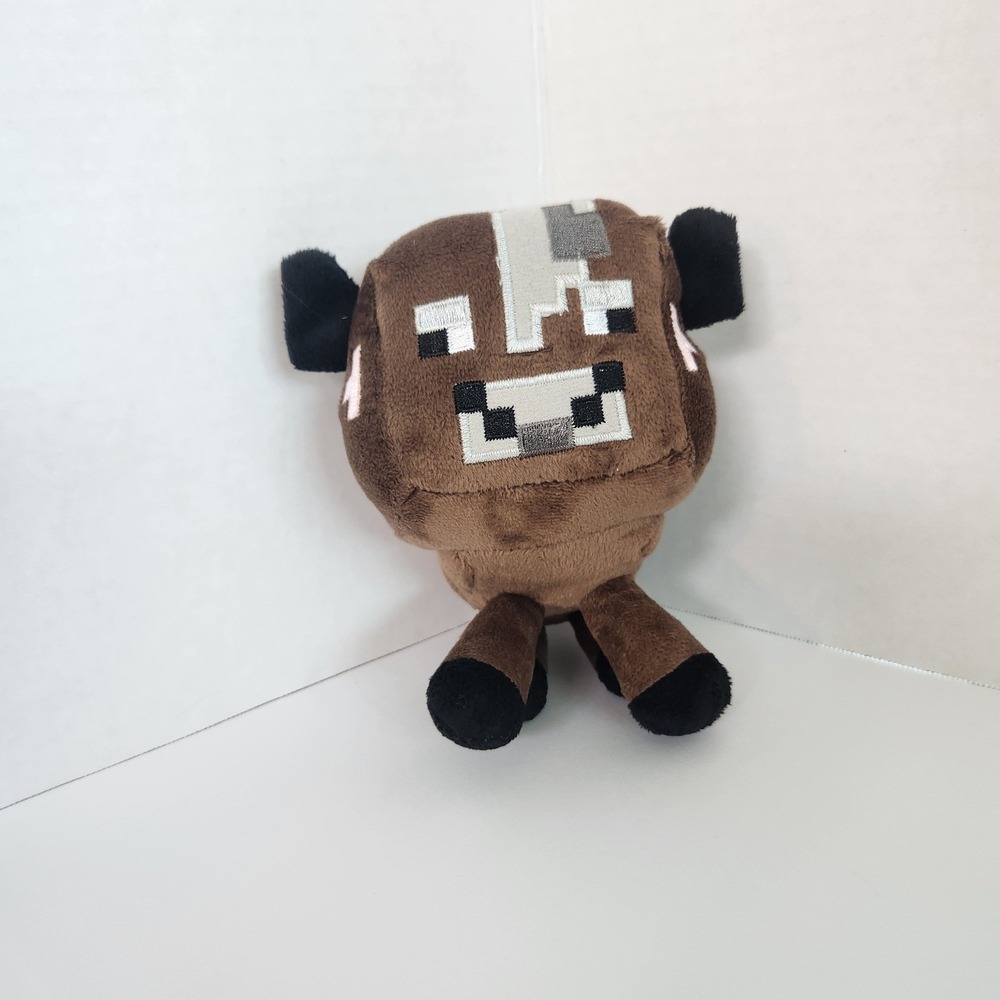 The official Minecraft Brand Baby Cow Plush 7'' Perfect for any fan's collection